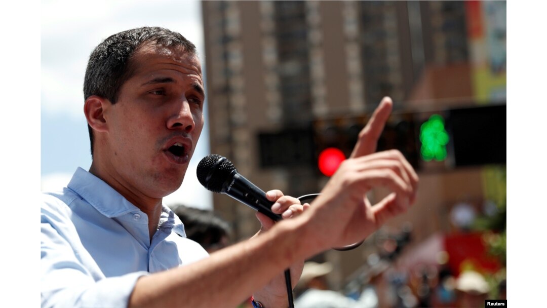 Venezuelan opposition leader Juan Guaido, whom many nations have recognized as the country's rightful interim ruler, attends a rally against Venezuelan President Nicolas Maduro's government in Caracas, April 6, 2019.