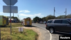 Fire trucks are seen near a Baptist church in Sutherland Springs, Texas, Nov. 5, 2017, in a picture obtained via social media. (MAX MASSEY/KSAT 12)