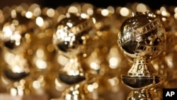 FILE - In this Jan.. 6, 2009, file photo, Golden Globe statuettes are displayed during a news conference in Beverly Hills, Calif. 