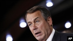 House Speaker John Boehner of Ohio speaks to reporters on Capitol Hill in Washington, June 16, 2011