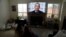 Former President Barack Obama delivers a virtual address, as seen on a TV in a home in San Diego, California, May 16, 2020.