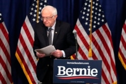FILE - Democratic presidential candidate Bernie Sanders walks away from the podium after speaking to reporters in Burlington, Vermont, March 11, 2020.