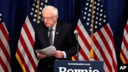 Democratic presidential candidate Bernie Sanders walks away from the podium after speaking to reporters in Burlington, Vermont, March 11, 2020.