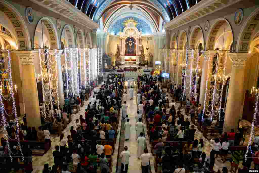 Filipino Catholics attend the first of the nine-day dawn mass known as Misa de Gallo, ahead of Christmas, at the Immaculate Conception Cathedral of Cubao, in Quezon City, Metro Manila, Philippines, Dec. 16, 2024. 