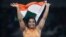 India's Sakshi Malik reacts after winning bronze against Kyrgyzstan's Aisuluu Tynybekova in the Women's Wrestling Freestyle 58-kg Competition at the 2016 Summer Olympics in Rio de Janeiro, Brazil, Aug. 17, 2016.