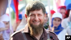 Chechnya's regional leader Ramzan Kadyrov smiles while visiting the Chechen State University in Chechnya's provincial capital Grozny, Russia, Aug. 11, 2016.