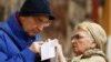 Voters at a polling station during the second round of a presidential election in Kyiv, Ukraine April 21, 2019. 