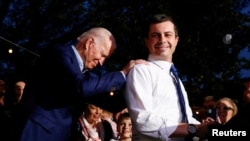 FILE - Former Democratic presidential candidate Pete Buttigieg endorses former U.S. Vice President Joe Biden at Chicken Scratch in Dallas, Texas, March 2, 2020. 