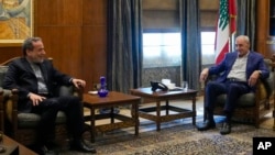 Iranian Foreign Minister Abbas Araghchi, left, meets with Lebanese Parliament speaker Nabih Berri, in Beirut, Lebanon, Oct. 4, 2024.