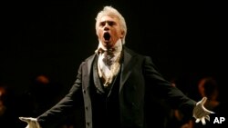 FILE - In this Feb. 6, 2007, photo, Dmitri Hvorostovsky performs during the final dress rehearsal for the opera "Eugene Onegin" in New York. The beloved Russian baritone “died peacefully” early Wednesday morning, Nov. 22, 2017, after a long battle with cancer.