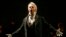 FILE - In this Feb. 6, 2007, photo, Dmitri Hvorostovsky performs during the final dress rehearsal for the opera "Eugene Onegin" in New York. The beloved Russian baritone “died peacefully” early Wednesday morning, Nov. 22, 2017, after a long battle with cancer.