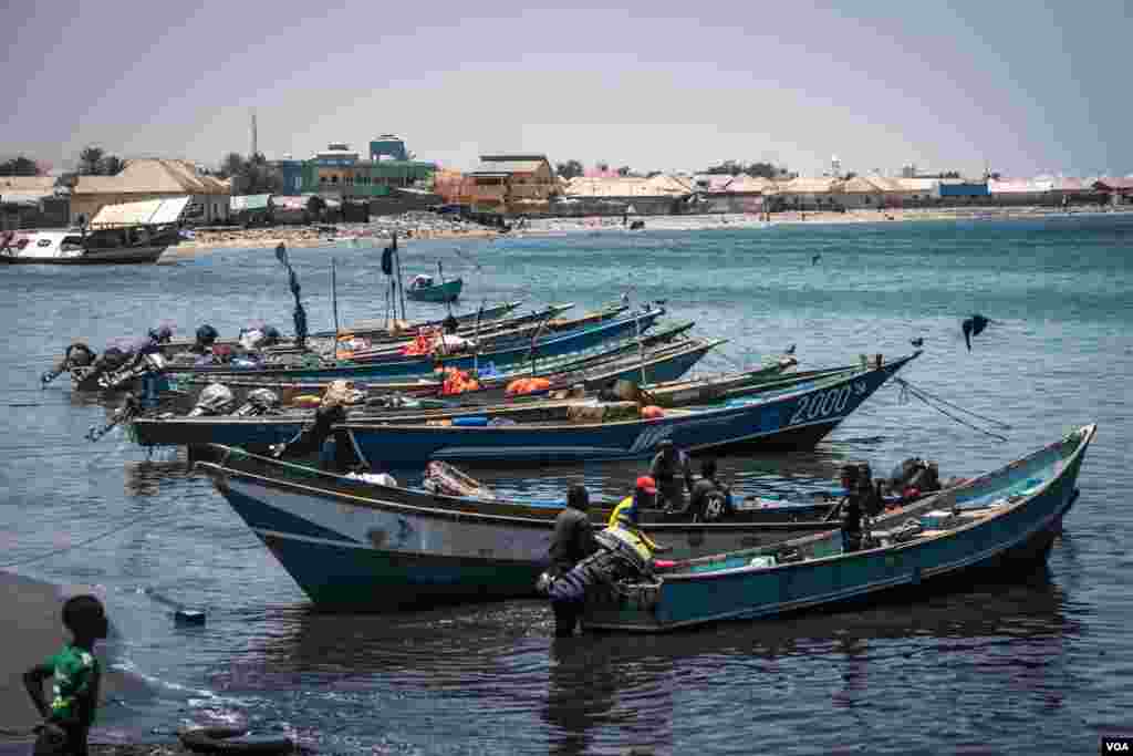 Small local fishing boats sit in harbor in Bossaso, northern Somalia in late March 2018. (J. Patinkin/VOA)