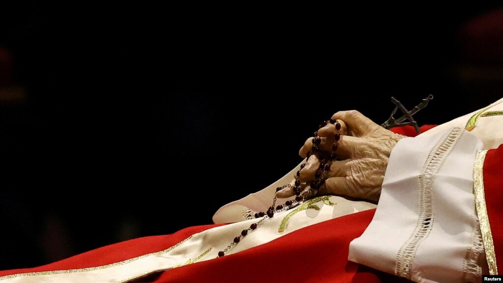 Faithful pay homage to former Pope Benedict in St. Peter's Basilica at the Vatican