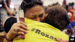 Supporters of Philippine presidential candidate Mar Roxas grieve as they attend his press conference in suburban Quezon city , north of Manila, Philippines on Tuesday, May 10, 2016.