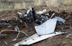 The remains of an unmanned aerial vehicle are pictured on the outskirts of Stepanakert during the military conflict over the breakaway Nagorno-Karabakh region, Oct. 11, 2020.