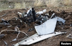 The remains of an unmanned aerial vehicle are pictured on the outskirts of Stepanakert during the military conflict over the breakaway Nagorno-Karabakh region, Oct. 11, 2020.