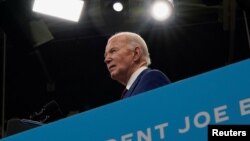 U.S. President Joe Biden, on the reelection campaign trail, looks on during his visit at the Chavis Community Center in Raleigh, North Carolina, on March 26, 2024. Biden won his party's primary in Missouri, the state Democratic Party announced.