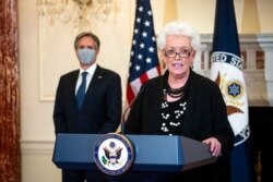 FILE - Gayle Smith, State Department Coordinator for Global COVID-19 Response and Health Security, speaks about U.S. leadership in fighting the coronavirus pandemic at the State Department in Washington, April 5, 2021.
