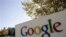 FILE - Google signage is seen at the company's headquarters in Mountain View, California. 