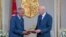Tunisian President Kais Saied, right, speaks with Tunisia's new Prime Minister Habib Jemli at the presidential palace in Carthage near Tunis, Tunisia, Nov. 15, 2019. 