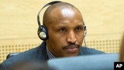 FILE - Bosco Ntaganda awaits the start of a hearing at the International Criminal Court (ICC) in The Hague, Netherlands.