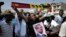 FILE - Supporters of Senegal opposition leader Ousmane Sonko take to the streets of Dakar, Tuesday March 14, 2023.