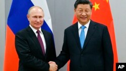 블라디미르 푸틴 러시아 대통령(왼쪽)과 시진핑 중국 국가주석. (자료사진)