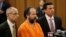 Ariel Castro, center, stands before a judge with his defense attorneys, Jaye Schlachet, left, and Craig Weintraub during Castro's arraignment on an expanded 977-count indictment, July 17, 2013, in Cleveland. 