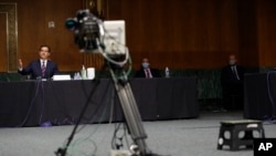 Rep. John Ratcliffe, R-Texas, testifies before a Senate Intelligence Committee nomination hearing on Capitol Hill in Washington, May. 5, 2020.