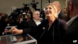 French far-right presidential candidate, Marine Le Pen casts her vote, in Lille, northern France, March 10, 2018. 