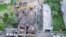 Partly Demolished Building Collapses Onto Road in Taiwan