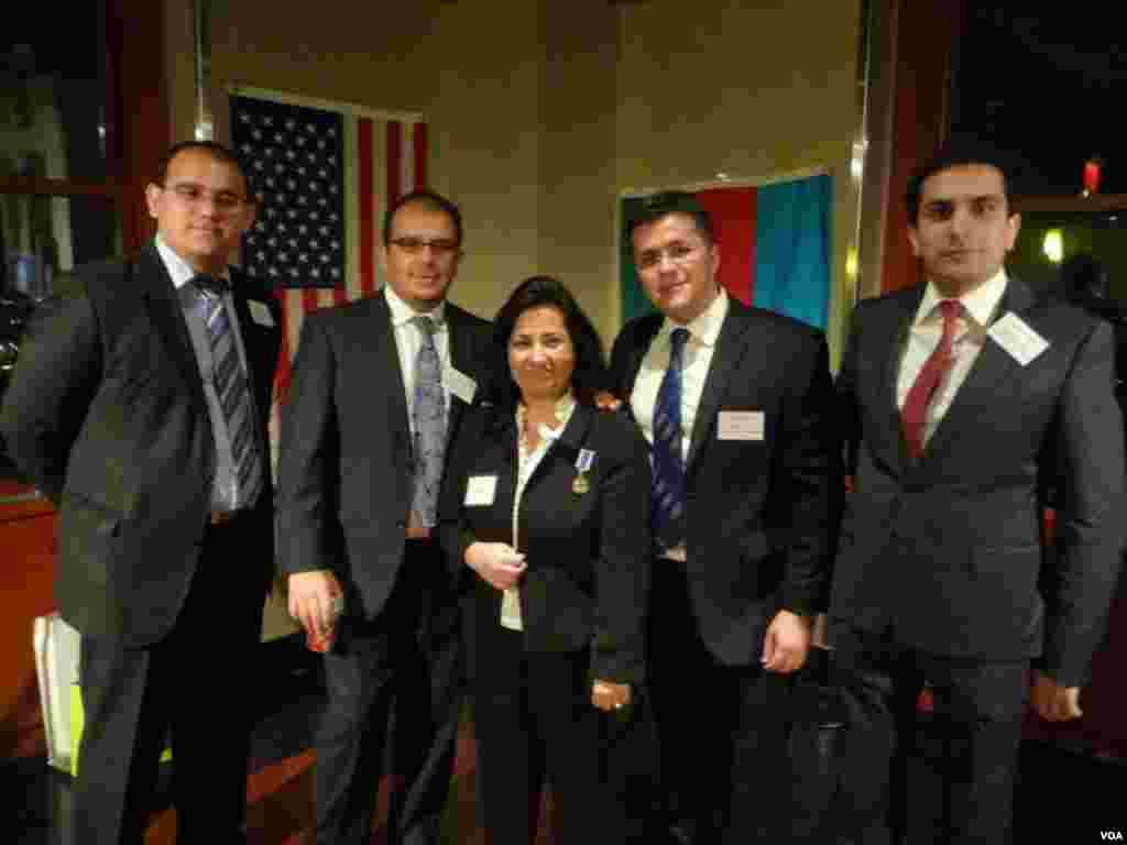 A gondola used to transport people to the biathlon and cross country skiing venues is silhouetted against the rising moon in Krasnaya Polyana, Russia.