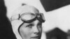 Amelia Earhart, 39, stands next to a Lockheed Electra 10E, before her last flight in 1937 from Oakland, Calif., bound for Honolulu on the first leg of her record-setting attempt to circumnavigate the world westward along the equator.