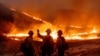 Fire crews battle the Kenneth Fire in the West Hills section of Los Angeles, Jan. 9, 2025. (