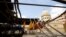 Colored yarns are hung up to dry on the roof of a dye workshop in old Cairo, Egypt, March 17, 2016. 