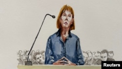 Gisele Pelicot, who has allegedly been drugged and raped by men solicited by her then-husband, Dominique Pelicot, talks during the trial of her husband and 50 other defendants at the courthouse in Avignon, France, Sept. 18, 2024, in this courtroom sketch.