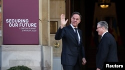 British Prime Minister Keir Starmer welcomes NATO Secretary-General Mark Rutte on the day of the European leaders' summit to discuss European security and Ukraine, at Lancaster House in London, March 2, 2025. 