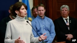 South Dakota Governor Kristi Noem speaks with reporters in Pierre, March, 5, 2020.