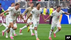 2026년 7월 4일 미국 휴스턴에서 열린 월드컵 16강전 캐나다와의 경기를 마친 뒤, 모로코 선수들이 환호하고 있다.