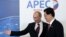 Russia's President Vladimir Putin greets China's President Hu Jintao upon his arrival at the APEC Summit in Vladivostok September 8, 2012. 