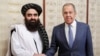 In this photo released by Russian Foreign Ministry Press Service on Oct. 4, 2024, Russian Foreign Minister Sergey Lavrov and Acting Foreign Minister of Afghanistan's Taliban movement Amir Khan Muttaqi pose for a photo before their talks in Moscow.