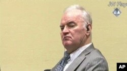 FILE - А Dec. 5, 2016, photo taken from video shows former Bosnian Serb military commander Gen. Ratko Mladic as he looks across the courtroom at the International Criminal Tribunal for the Former Yugoslavia in The Hague, Netherlands.