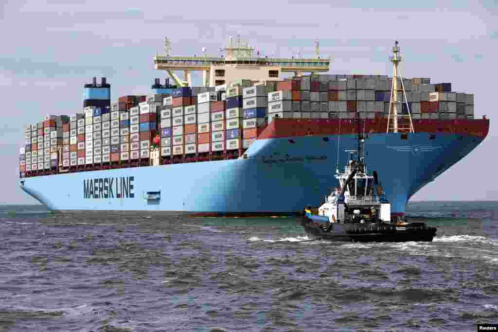 The MV Maersk Mc-Kinney Moller, the world&#39;s biggest container ship, arrives at the harbor of Rotterdam, the Netherlands. The 55,000-ton ship, named after the son of the founder of the oil and shipping group A.P. Moller-Maersk, has a length of 400 meters and cost $185 million.