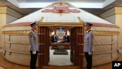 Russian President Vladimir Putin, center left, and Mongolian President Ukhnaagiin Khurelsukh attend their meeting at the Saaral Ordon Government Building in Ulaanbaatar, Mongolia, Sept. 3, 2024. 