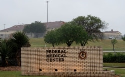 The front entrance of Federal Medical Center prison in Fort Worth, Texas, May 16, 2020. Hundreds of inmates inside the facility have tested positive for COVID-19 and several inmates have died with numbers expected to rise.