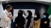 گروهی از فعالان حقوق زنان واشنگتن در حمایت از زنان افغانستان تجمع کردند
