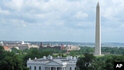 L'obélisque de Washington (arrière-plan) et la Maison Blanche