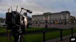 Media cameras outside Buckingham Palace, in London, Jan. 10, 2020.