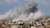 TOPSHOT - Smoke billows after an Israeli air strike in Rafah in the southern Gaza Strip on October 16, 2023.