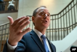 FILE - House Intelligence Committee Chairman Adam Schiff, a Democrat, speaks to reporters after the panel met behind closed doors about a whistleblower complaint, at the Capitol in Washington, Sept. 19, 2019.